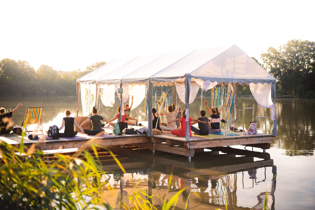 A peaceful yoga class at sunrise on the shores of Pickwick Lake, Tennessee
